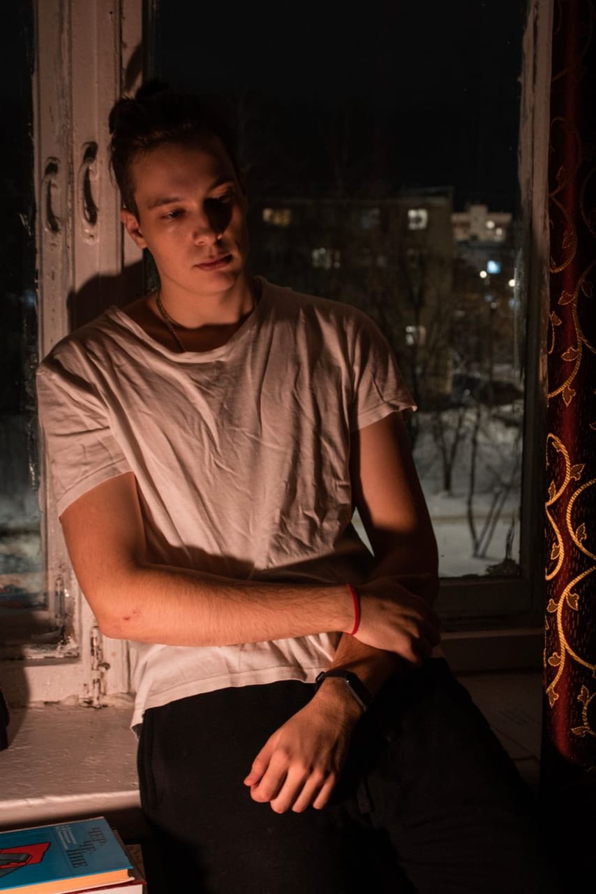 A man by the window in the morning light