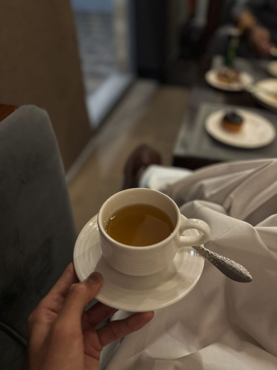 A warm cup held in both hands