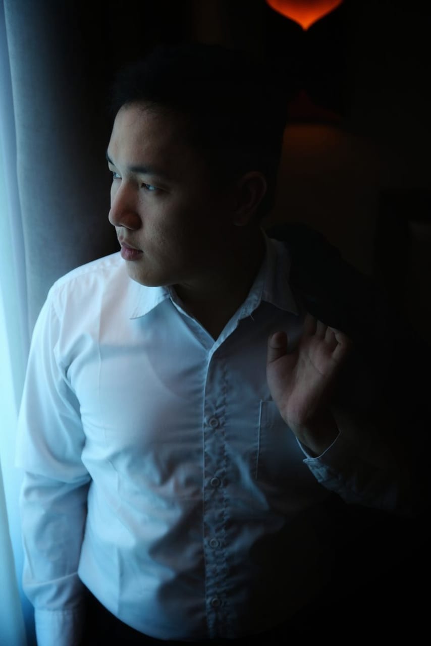 A man in a quiet, thoughtful moment